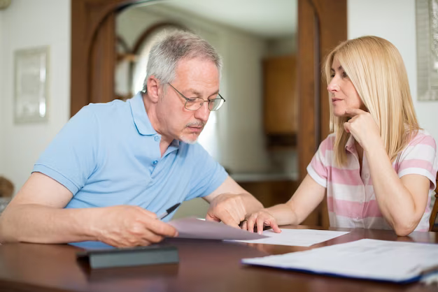Couple going through documents together