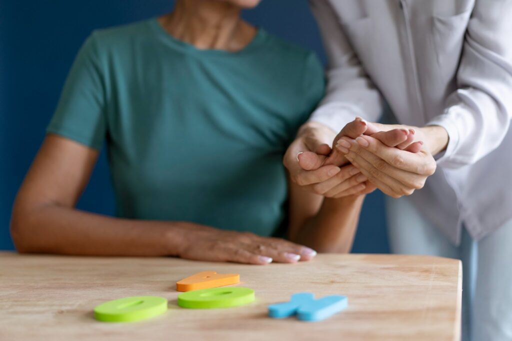 Close up of woman doing an occupational therapy session with a psychologist