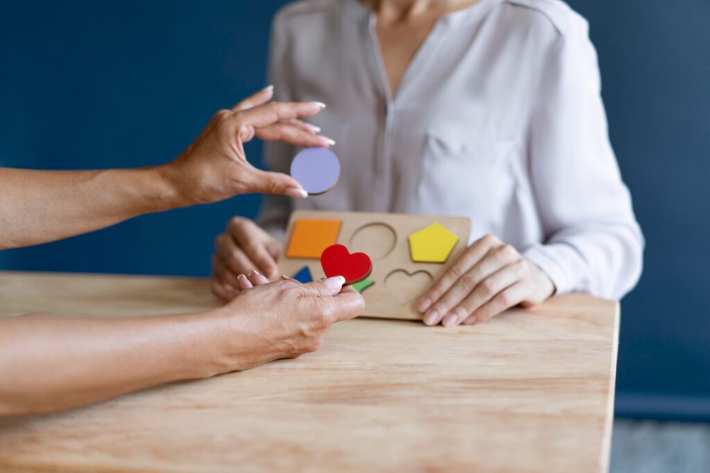Woman doing an occupational therapy session with a psychologist
