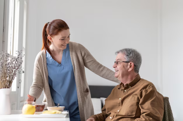 Woman caring for an elderly man